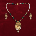 Traditional Ganesha Temple Necklace Set with Kundan Work and Pearl Drops β Red & Green Beads β Ashthi Jewels