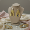 Regal Pearl & Gold Sculpted Statement Earrings